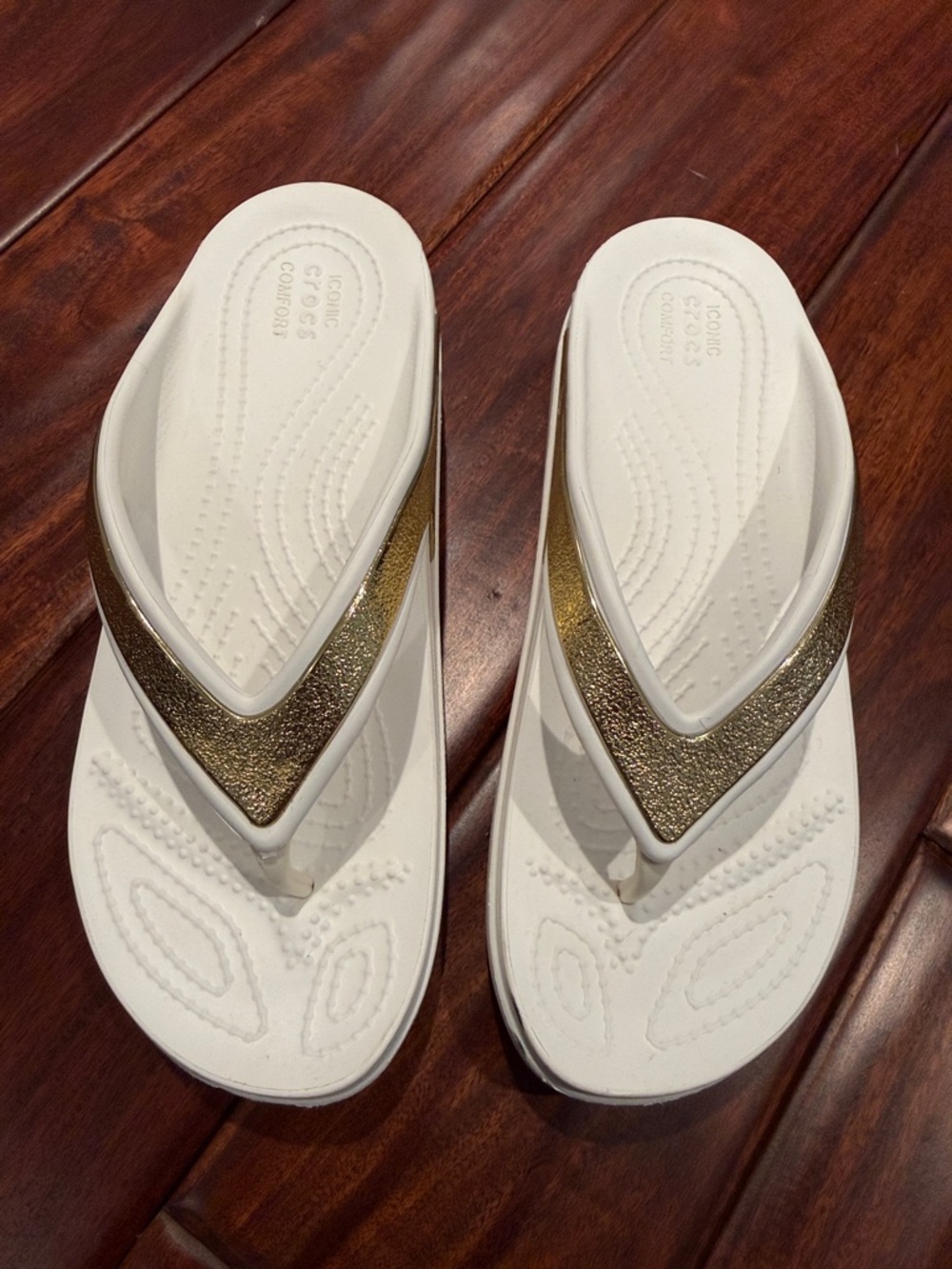 CROCS Women’s White Sandals with Metallic Gold V-Strap